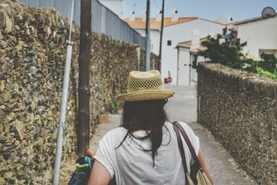 Close-up of woman standing by railing