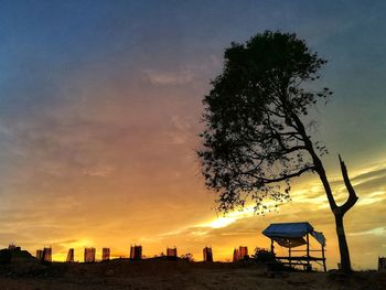 Silhouette tree against sky during sunset