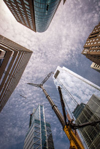 Low angle view of modern buildings against sky