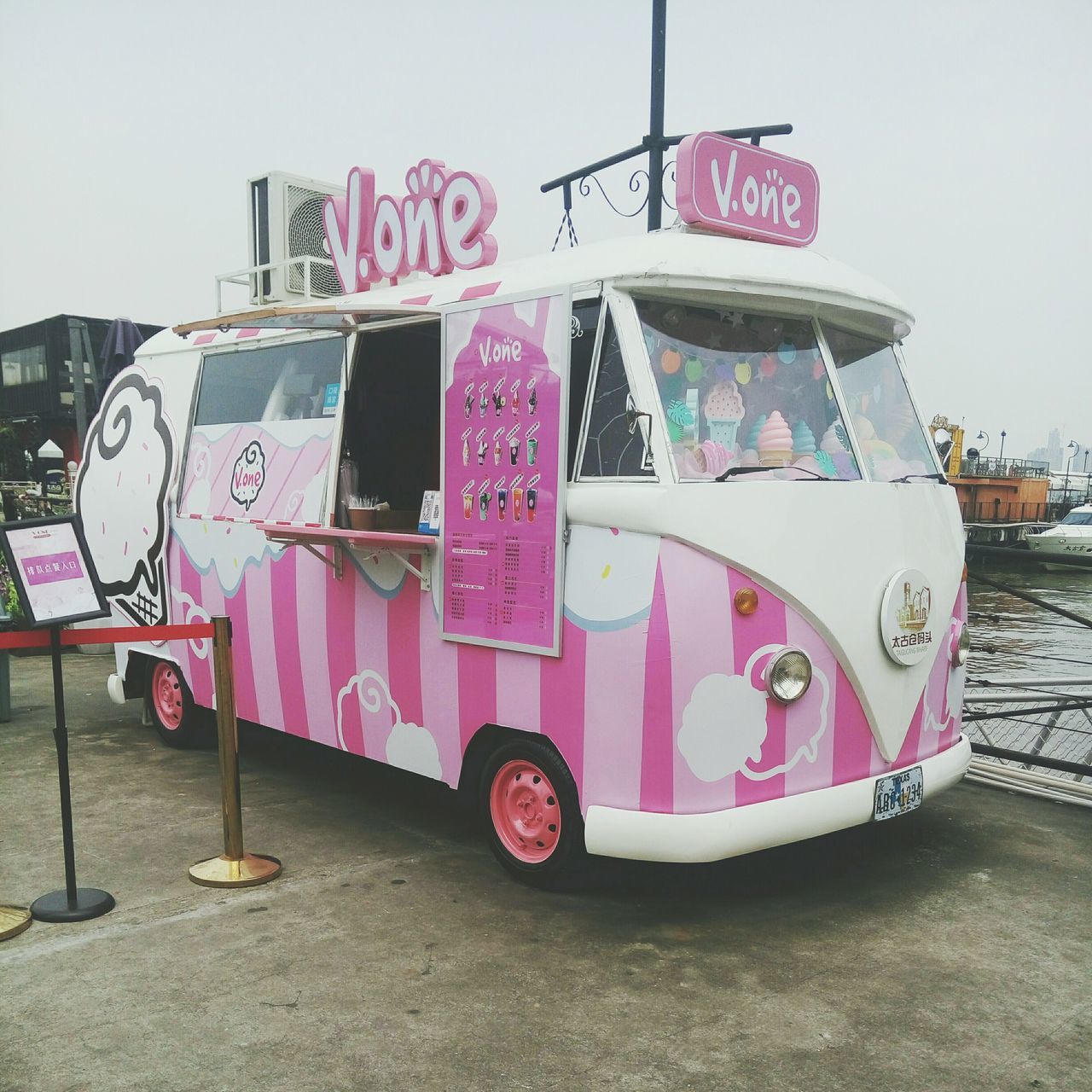 pink color, day, transportation, land vehicle, communication, outdoors, no people, sky, close-up