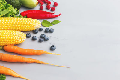 High angle view of fruits in plate on table