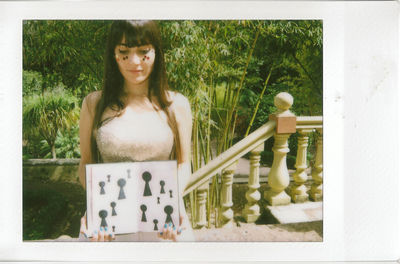 Close-up of woman standing in pond