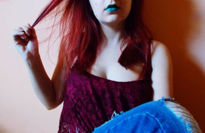 Close-up of young woman with arms hair