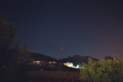 Scenic view of star field against sky at night