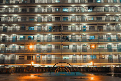Reflection of building in city at night