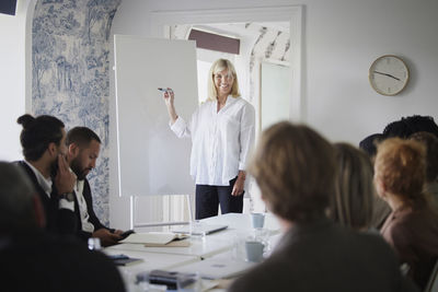 Woman having presentation at business meeting