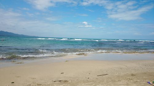 Scenic view of beach against sky