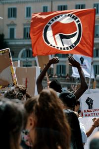 Group of people protesting on the road