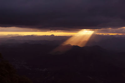 Scenic view of mountains against sky during sunset