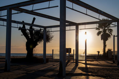 Scenic view of sea against clear sky at sunset