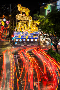 High angle view of illuminated street at night