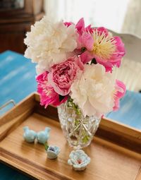 Close-up of pink flowers on table