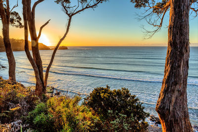 Scenic view of sea against sky during sunset