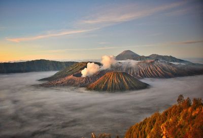 Scenic view of volcanic mountain against sky