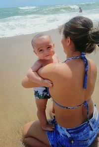 Couple kissing at beach