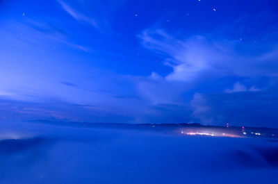 Scenic view of sea against sky at night