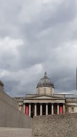 Building against cloudy sky