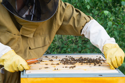 Midsection of man holding hands