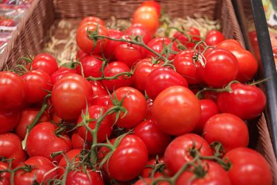 Close-up of tomatoes in basket for sale