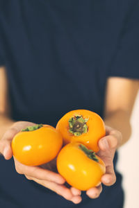 Close-up of hand holding vegetables