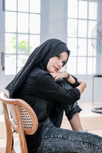 Young woman using mobile phone