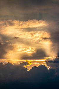Low angle view of dramatic sky during sunset