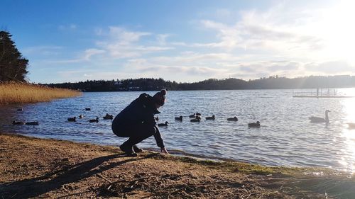 Man on beach against sky