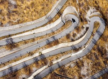 Aerial view of curvy mountain road. 