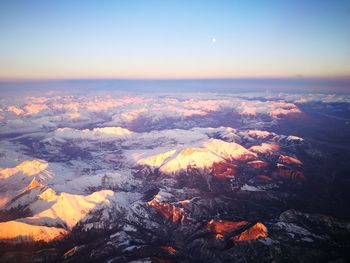 Scenic view of dramatic landscape against sky during winter