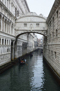 View of canal along buildings