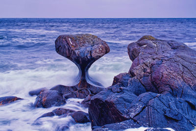 Long exposure of a water-worn rock along the coast of norway