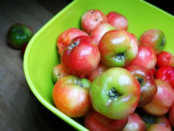 High angle view of apples in bowl on table