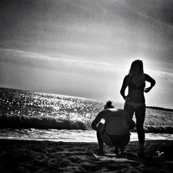 Woman standing on beach