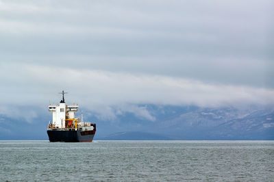 Ship in sea against sky