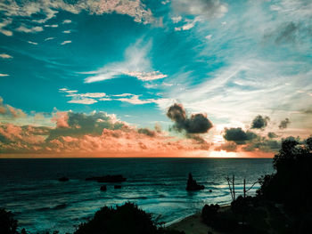 Scenic view of sea against sky at sunset