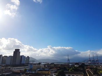 Buildings in city against sky