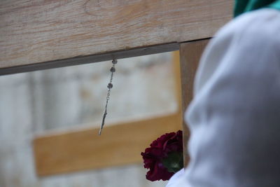 Close-up of rose petals on wood