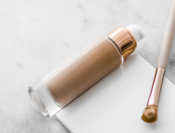 High angle view of beauty products on table