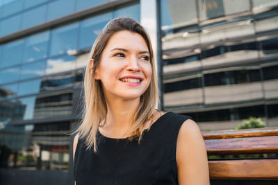 Portrait of smiling young woman