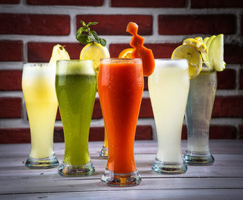 Close-up of various drinks on table