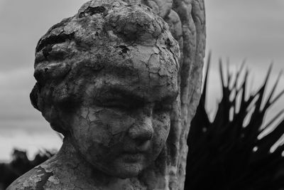 Close-up of statue against sky