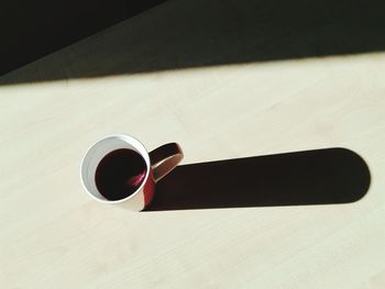 Close-up of coffee cup on table