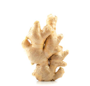 Close-up of bread against white background