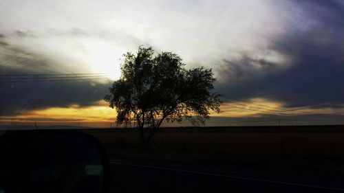 Scenic view of landscape at sunset