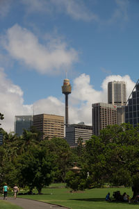 Modern building against cloudy sky