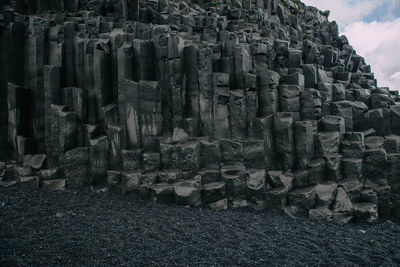 Stack of sculpture against sky