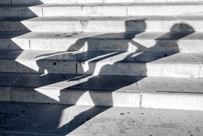 Shadow of people on wall