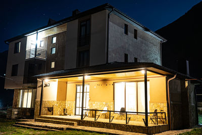 Low angle view of old building against sky at night