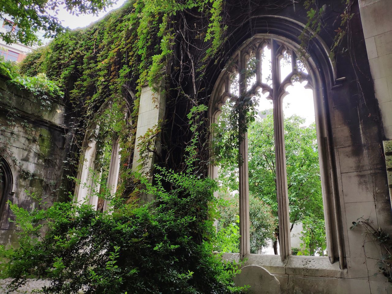 LOW ANGLE VIEW OF ABANDONED BUILDING