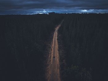 Road passing through field